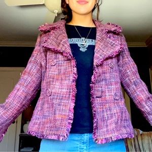 Beautiful jacket. Nice collar and details. Pretty warm with slit on the sleeves